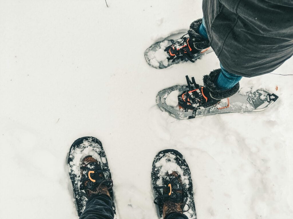 Snowshoeing in winter vacation